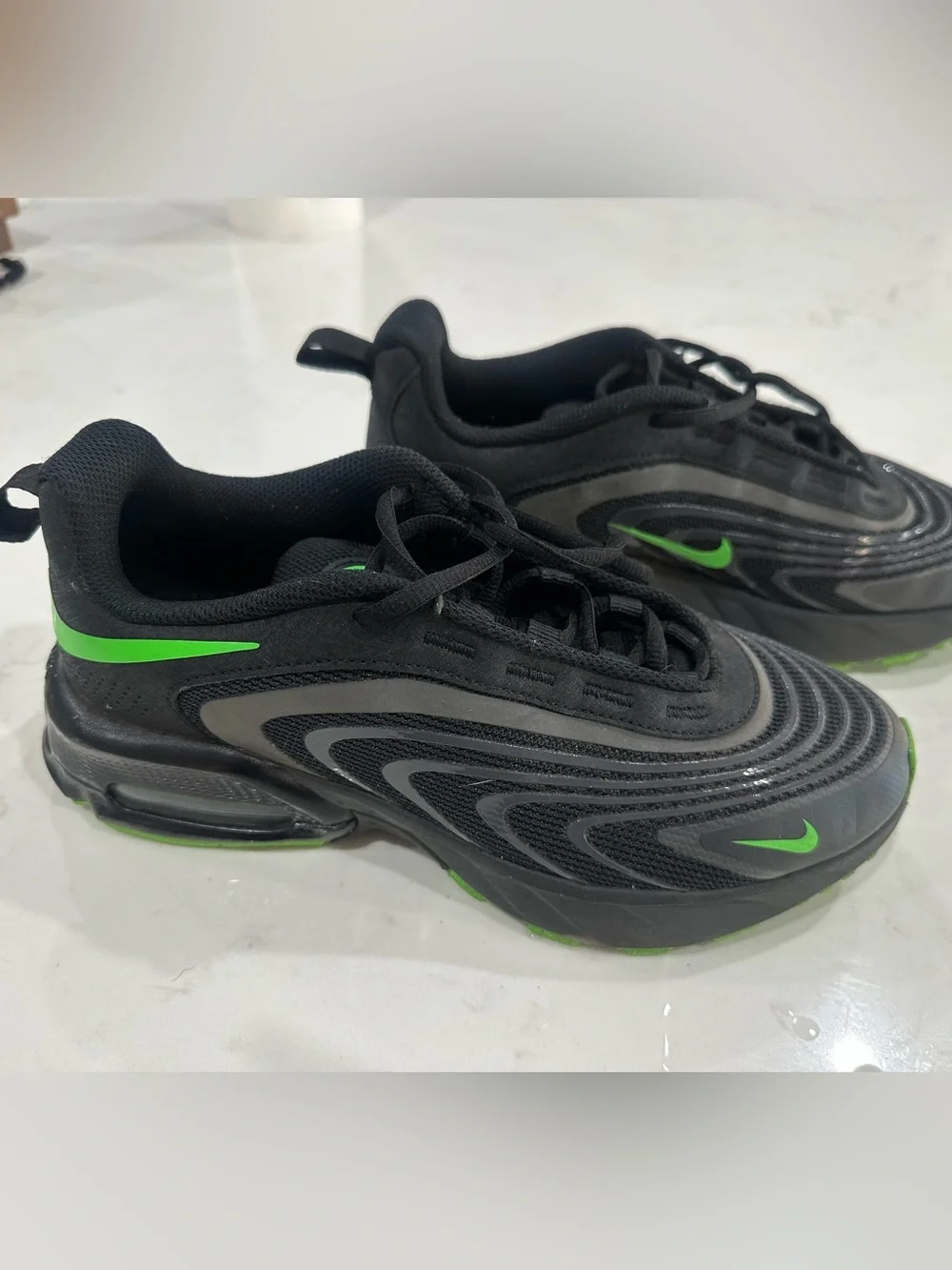 Nike Men’s Black Sneakers with Neon Green Swoosh